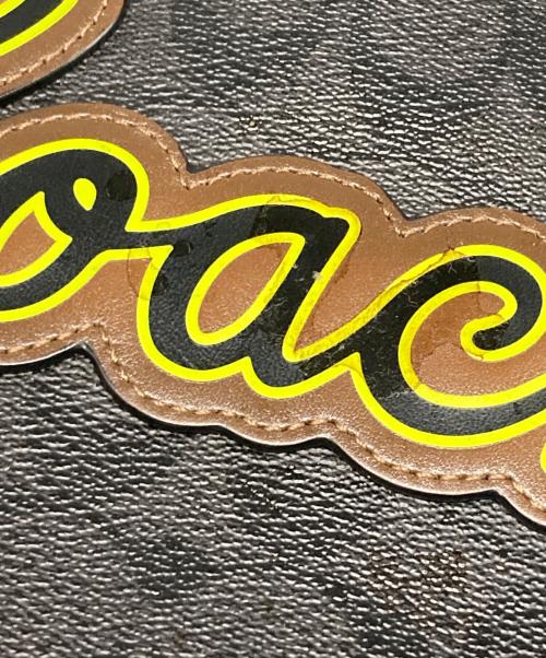 COACH（コーチ）COACH (コーチ) シグネチャー柄クラッチバッグ ブラックの古着・服飾アイテム
