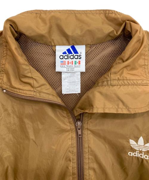adidas（アディダス）adidas (アディダス) ナイロントラックジャケット ブラウン サイズ:Mの古着・服飾アイテム