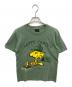 CHANGES（チェンジズ）の古着「90’sウッドストックプリントTシャツ」｜カーキ