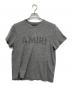 AMIRI（アミリ）の古着「ロゴTシャツ」｜グレー