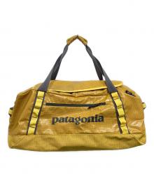 Patagonia（パタゴニア）の古着「ブラックホール ダッフル バッグ 60L」｜イエロー
