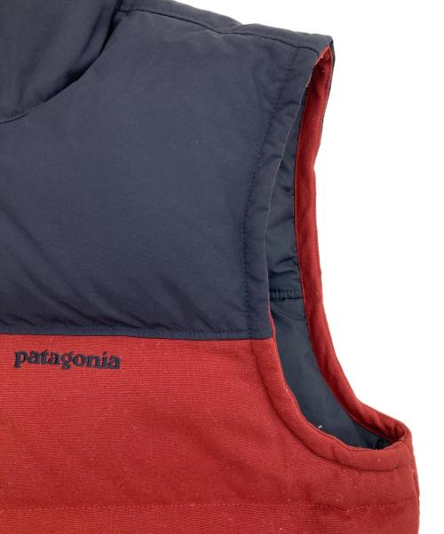 Patagonia（パタゴニア）Patagonia (パタゴニア) BIVY DOWN VEST/バイカラーダウンベスト ネイビー×レッド サイズ:Mの古着・服飾アイテム