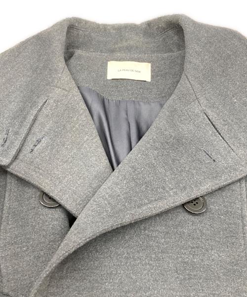 la peau de gem（ラポドゥジェム）la peau de gem (ラポドゥジェム) 2WAYカラーロングダブルコート グレー サイズ:SIZE38の古着・服飾アイテム