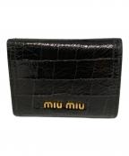 MIU MIUミュウミュウ）の古着「クロコ型押し3つ折り財布」｜ブラック