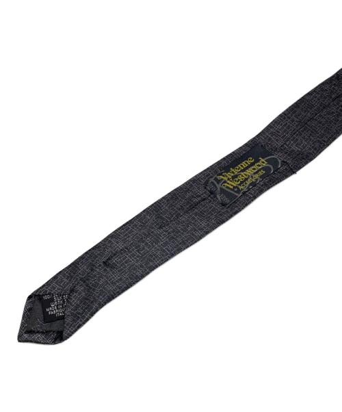 Vivienne Westwood（ヴィヴィアンウエストウッド）Vivienne Westwood (ヴィヴィアンウエストウッド) 総柄シルクネクタイ ブラック サイズ:不明の古着・服飾アイテム