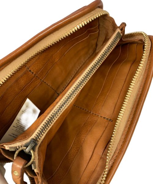 campomaggi（カンポマッジ）campomaggi (カンポマッジ) スタッズラウンドジップウォレット ベージュの古着・服飾アイテム