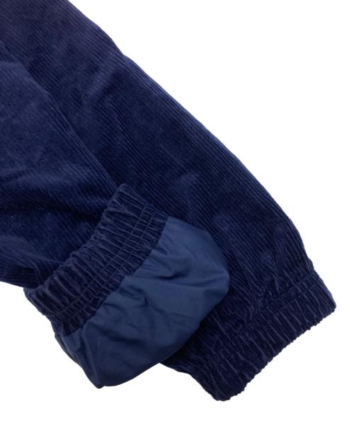 PUMA（プーマ）PUMA (プーマ) BUTTER GOODS (バターグッズ) TRACK TOP ネイビー サイズ:SIZE　Mの古着・服飾アイテム