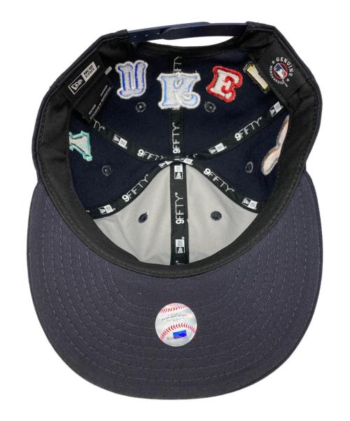 New Era（ニューエラ）New Era (ニューエラ) SAINT MICHAEL (セントマイケル) BORN & RAISED 59FIFTY Baseball Cap ネイビーの古着・服飾アイテム