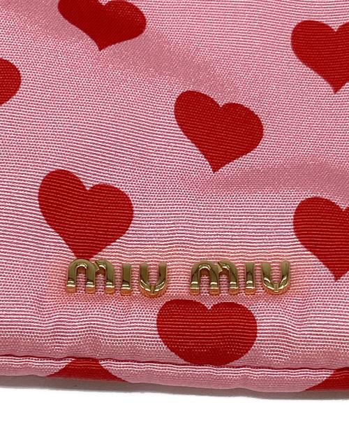MIU MIU（ミュウミュウ）MIU MIU (ミュウミュウ) ハート柄巾着ポーチ ピンクの古着・服飾アイテム