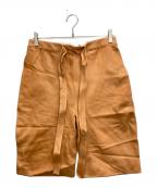 J.W.ANDERSONジェイダブリューアンダーソン）の古着「Paper Leather Short」｜ブラウン
