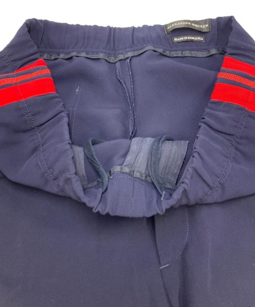 ALEXANDER McQUEEN（アレキサンダーマックイーン）ALEXANDER McQUEEN (アレキサンダーマックイーン) サイドライントラックパンツ ネイビー サイズ:48の古着・服飾アイテム