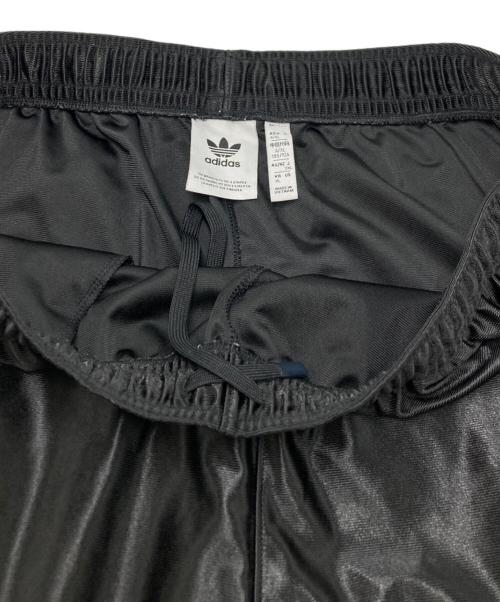adidas（アディダス）adidas (アディダス) オーバーサイズ ファイヤーバード トラックパンツ ブラック サイズ:SIZE 2XLの古着・服飾アイテム