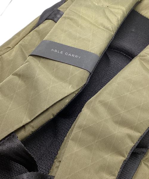 ABLE CARRY（エイブルキャリー）ABLE CARRY (エイブルキャリー) Daily Plus X-Pac バックパック オリーブの古着・服飾アイテム