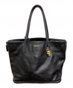 ALEXANDER McQUEENアレキサンダーマックイーン）の古着「スカルチャームレザートートバッグ」｜ブラック