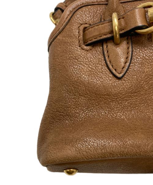 MIU MIU（ミュウミュウ）MIU MIU (ミュウミュウ) トリック レザー バッグチャーム ブラウンの古着・服飾アイテム