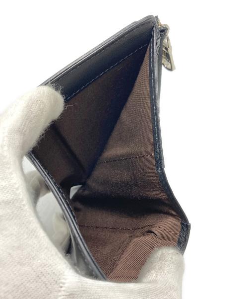 russet（ラシット）russet (ラシット) ミニモノグラムプレートハーフウォレット ブラックの古着・服飾アイテム