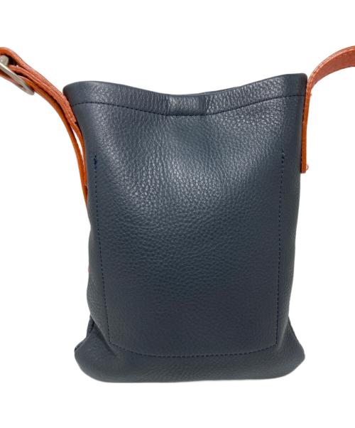 HENDER SCHEME（エンダースキーマ）Hender Scheme (エンダースキーマ) ワンサイドベルトバックスモール ネイビー×オレンジの古着・服飾アイテム