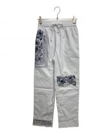 Acne studios（アクネ ストゥディオス）の古着「刺繍イージーパンツ」｜ブルー