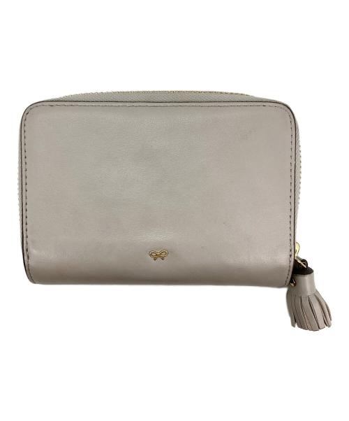 ANYA HINDMARCH（アニヤ・ハインドマーチ）ANYA HINDMARCH (アニヤ・ハインドマーチ) スマイル 二つ折り財布 グレーの古着・服飾アイテム