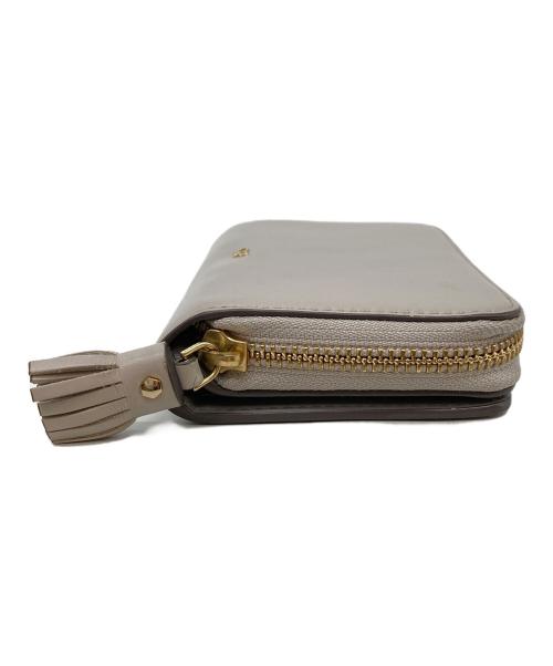 ANYA HINDMARCH（アニヤ・ハインドマーチ）ANYA HINDMARCH (アニヤ・ハインドマーチ) スマイル 二つ折り財布 グレーの古着・服飾アイテム
