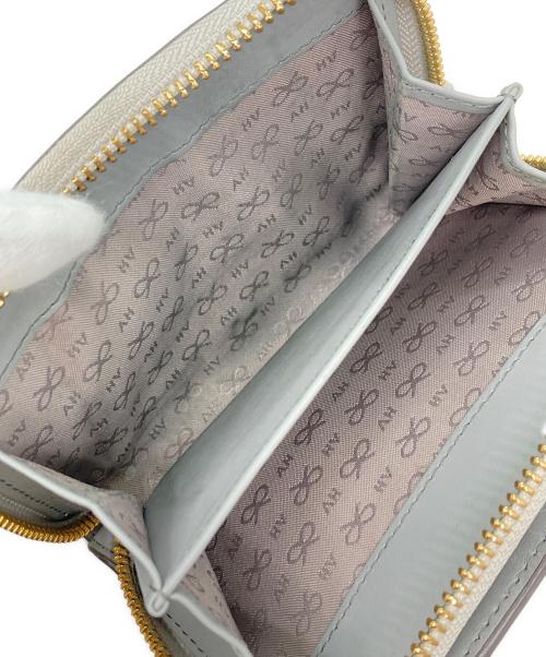 ANYA HINDMARCH（アニヤ・ハインドマーチ）ANYA HINDMARCH (アニヤ・ハインドマーチ) スマイル 二つ折り財布 グレーの古着・服飾アイテム