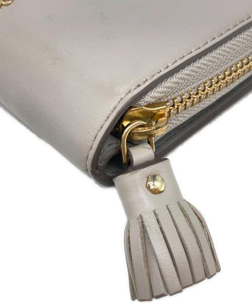 ANYA HINDMARCH（アニヤ・ハインドマーチ）ANYA HINDMARCH (アニヤ・ハインドマーチ) スマイル 二つ折り財布 グレーの古着・服飾アイテム