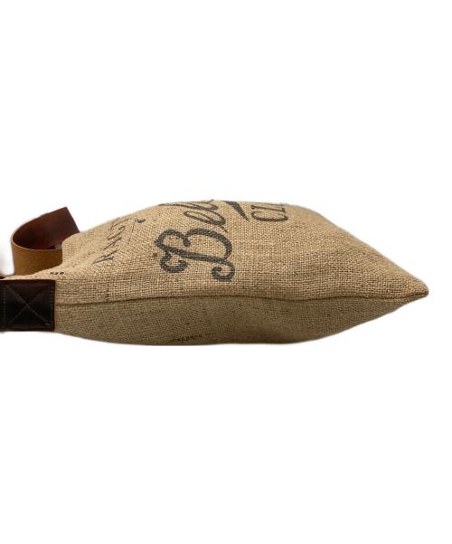 BELAFONTE（ベラフォンテ）BELAFONTE (ベラフォンテ) ニュースペーパーバッグ ベージュの古着・服飾アイテム