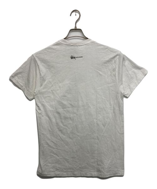 stussy（ステューシー）stussy (ステューシー) ティラノ Tシャツ ホワイト サイズ:SIZE　Mの古着・服飾アイテム