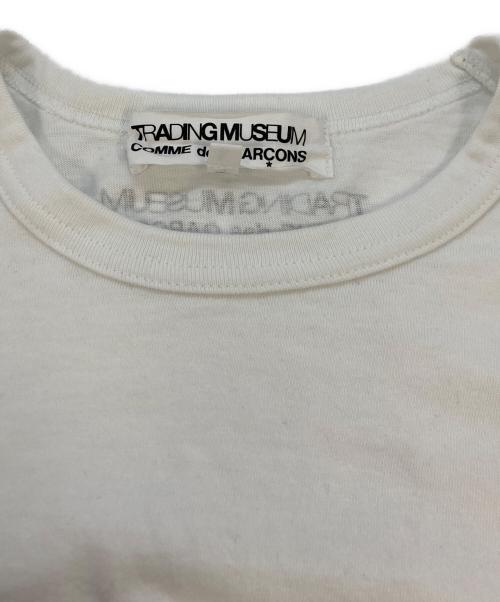 TRADING MUSEUM COMME des GARCONS（トレーディングミュージアムコムデギャルソン）TRADING MUSEUM COMME des GARCONS (トレーディングミュージアムコムデギャルソン) Tシャツ ホワイト サイズ:SIZE Lの古着・服飾アイテム
