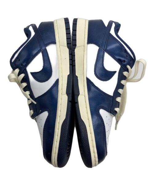 NIKE（ナイキ）NIKE (ナイキ) WMNS DUNK LOW PRM ネイビー×ホワイト サイズ:27.5の古着・服飾アイテム