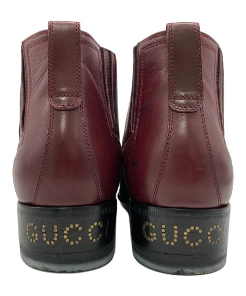 GUCCI（グッチ）GUCCI (グッチ) メダリオン レザー ベルト ショート ヒール ブーツ ボルドー サイズ:SIZE 38の古着・服飾アイテム