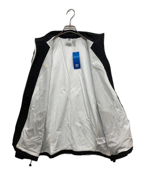 adidas（アディダス）adidas (アディダス) NTS Radio (NTSラジオ) 総柄プリント SSTトラックトップ ブラック×ホワイト サイズ:SIZE XL 未使用品の古着・服飾アイテム