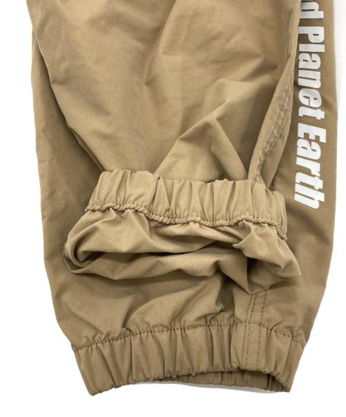 Aape BY A BATHING APE（エーエイプ バイ アベイシングエイプ）Aape BY A BATHING APE (エーエイプ バイ アベイシングエイプ) トラックパンツ ベージュ サイズ:SIZE Lの古着・服飾アイテム
