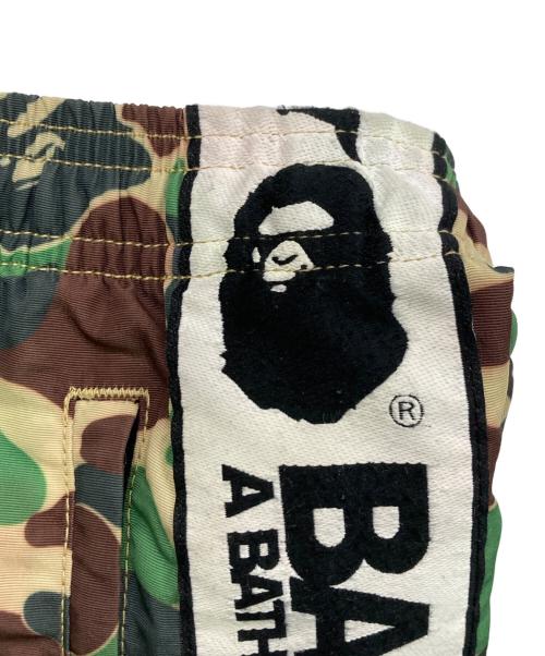 A BATHING APE（ア ベイシング エイプ）A BATHING APE (ア ベイシング エイプ) SAINT MICHAEL (セントマイケル) AP TRACK PNT グリーン サイズ:SIZE Mの古着・服飾アイテム