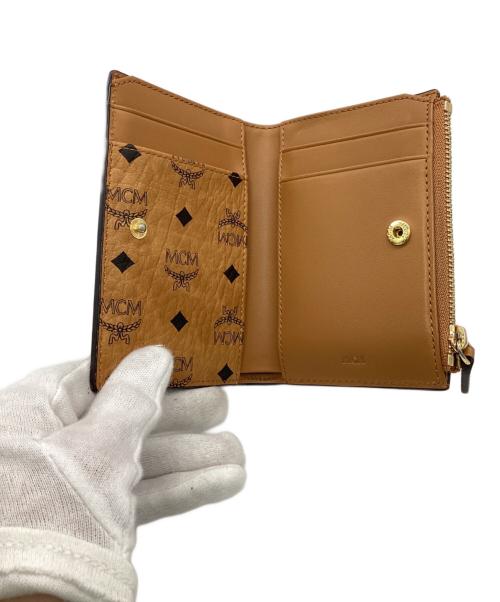 MCM（エムシーエム）MCM (エムシーエム) クレヨンしんちゃん (クレヨンシンチャン) Aren スモール ウォレット コニャックの古着・服飾アイテム