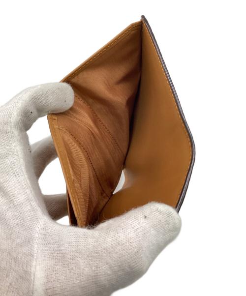 MCM（エムシーエム）MCM (エムシーエム) クレヨンしんちゃん (クレヨンシンチャン) Aren スモール ウォレット コニャックの古着・服飾アイテム