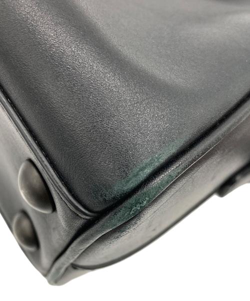 Saint Laurent Paris（サンローランパリ）Saint Laurent Paris (サンローランパリ) ベイビーダッフル スタッズバッグ ブラックの古着・服飾アイテム