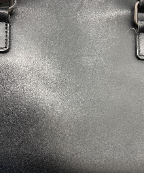 Saint Laurent Paris（サンローランパリ）Saint Laurent Paris (サンローランパリ) ベイビーダッフル スタッズバッグ ブラックの古着・服飾アイテム