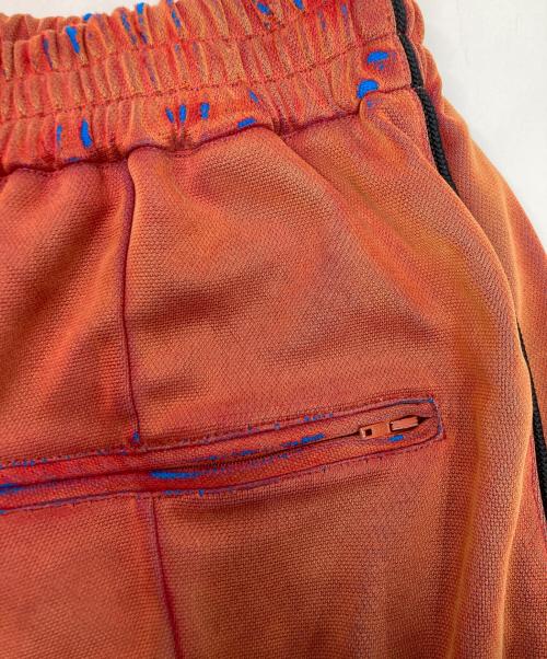 doublet（ダブレット）doublet (ダブレット) Zombie Silhouette TRACK PANTS オレンジ サイズ:SIZE Mの古着・服飾アイテム