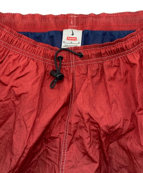 NIKE（ナイキ）NIKE (ナイキ) SUPREME (シュプリーム) Ripstop Track Pant Multicolor レッド×ネイビー サイズ:SIZE Mの古着・服飾アイテム