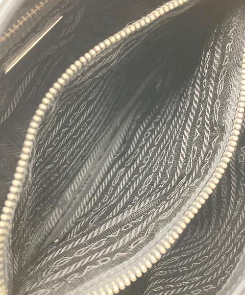 PRADA（プラダ）PRADA (プラダ) レザーナイロンコンビスタッズタッセルハンドバッグ ブラックの古着・服飾アイテム