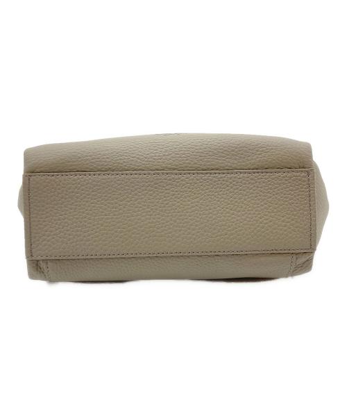 TUMI（トゥミ）TUMI (トゥミ) Kerrie Crossbody/ケリークロスボディバッグ ベージュの古着・服飾アイテム