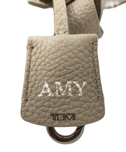 TUMI（トゥミ）TUMI (トゥミ) Kerrie Crossbody/ケリークロスボディバッグ ベージュの古着・服飾アイテム