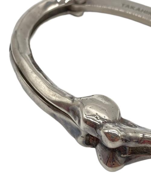TAKAHIROMIYASHITA TheSoloIst.（タカヒロミヤシタ ザソロイスト）TAKAHIROMIYASHITA TheSoloIst. (タカヒロミヤシタ ザソロイスト) END (エンド) BONE SHAPED HANDCUFFS BRACELET サイズ:実寸サイズをご参照下さい。の古着・服飾アイテム