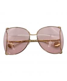 GUCCI（グッチ）の古着「オーバルフレーム サングラス」｜ゴールド