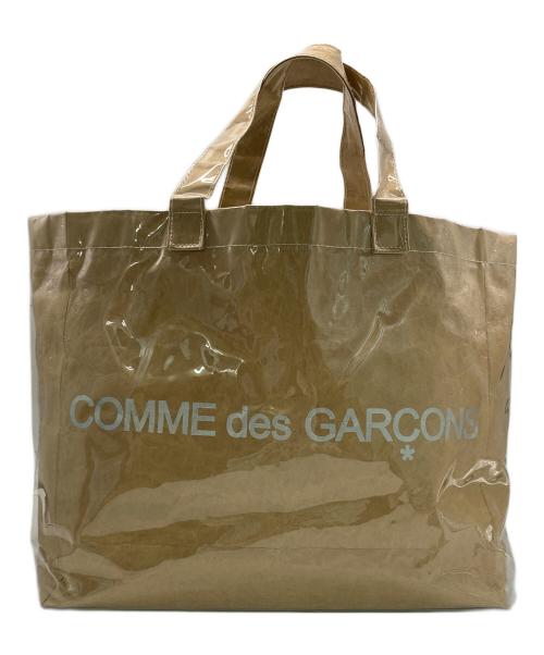 COMME des GARCONS（コムデギャルソン）COMME des GARCONS (コムデギャルソン) PVCぺーパーロゴトートバッグ ベージュの古着・服飾アイテム