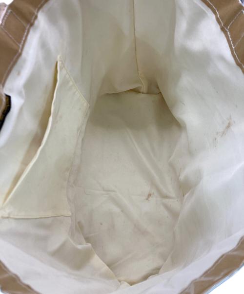 COMME des GARCONS（コムデギャルソン）COMME des GARCONS (コムデギャルソン) PVCぺーパーロゴトートバッグ ベージュの古着・服飾アイテム