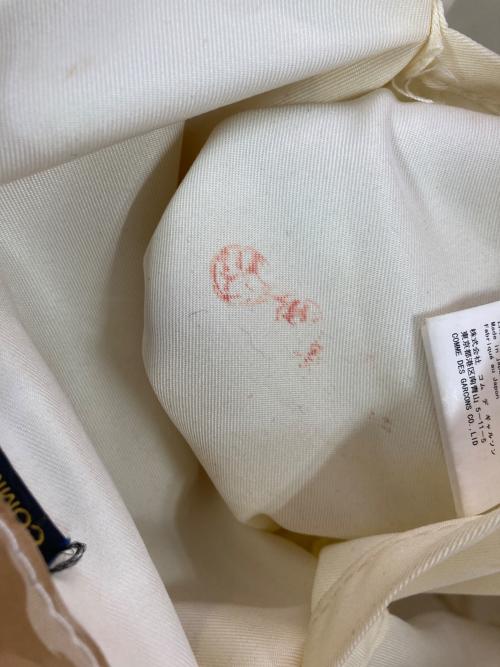 COMME des GARCONS（コムデギャルソン）COMME des GARCONS (コムデギャルソン) PVCぺーパーロゴトートバッグ ベージュの古着・服飾アイテム