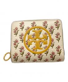 TORY BURCH（トリーバーチ）の古着「ラウンドジップウォレット」｜イエロー×ベージュ
