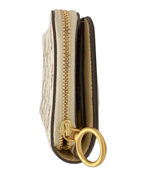 TORY BURCH（トリーバーチ）TORY BURCH (トリーバーチ) ラウンドジップウォレット イエロー×ベージュ サイズ:実寸サイズをご参照下さい。の古着・服飾アイテム